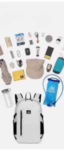 Flat lay of lightweight white outdoor backpack displaying large capacity for gear
