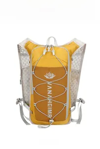 Front view of mustard yellow trail running vest with breathable mesh and elastic cords