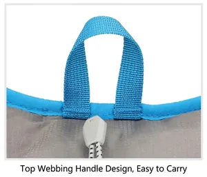 Detail of the blue reinforced nylon webbing handle on a gray outdoor cycling backpack