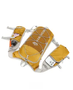 Detail view of mustard yellow running hydration vest with mesh pockets and phone storage