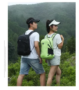 Outdoor hiking backpacks in black and lime green shown in a natural forest setting
