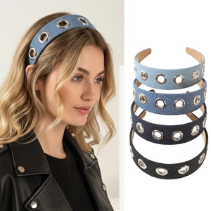 Detail of denim headbands with silver grommets in light blue, dark blue and black