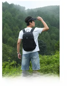 Close-up of lightweight black waterproof hiking backpack for outdoor and daily travel use
