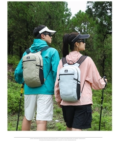 Outdoor hiking backpacks in khaki and light blue with breathable mesh side pockets
