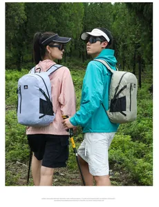 Outdoor hiking backpack with wide shoulder straps and side mesh pockets in nature