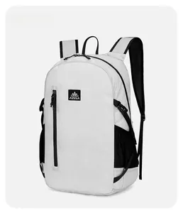 Detail view of AZELA hiking backpack featuring side mesh pockets and buckle straps