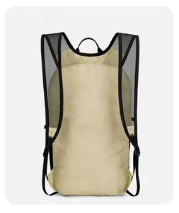 Detail view of khaki outdoor backpack featuring breathable black mesh shoulder straps