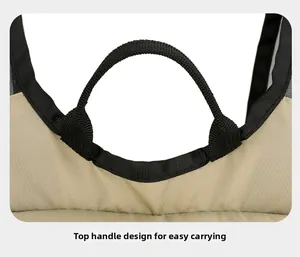 Top handle of khaki outdoor backpack with diamond pattern and black nylon webbing