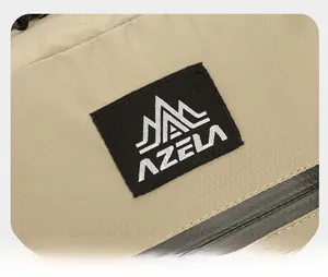 Macro shot of AZELA outdoor bag featuring ripstop fabric and waterproof zipper detail