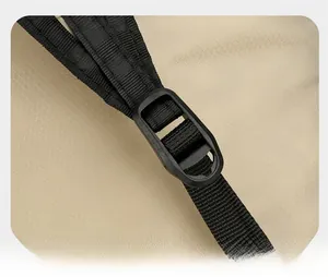 Close-up of adjustable shoulder strap with durable buckle on hiking backpack