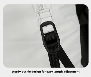 Detail of adjustable backpack buckle and nylon strap with reinforced stitching