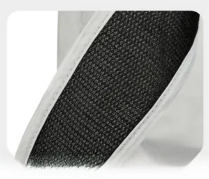 Detail of breathable honeycomb mesh shoulder straps on a lightweight hiking backpack