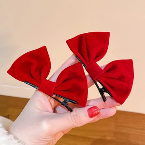 Paire de barrettes à nœuds en velours rouge élégantes pour une coiffure de fête