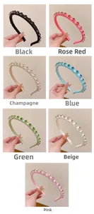 Close-up of padded velvet headbands with rhinestones in 7 vibrant colors and colors