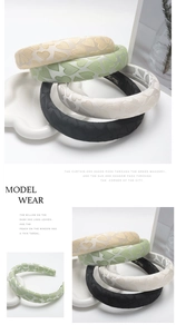 Detailed macro view of heart jacquard sponge headbands in white green and beige