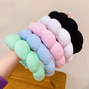 Gepolstertes Cloud-Haarband in Macaron-Farben für Gesichtspflege und High-Top-Styling