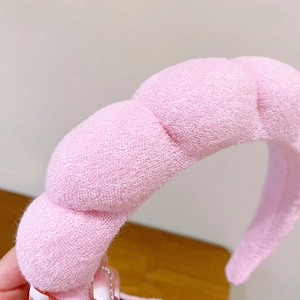 Rosa gepolstertes Stirnband zum Waschen mit dicker geflochtener Bubble-Stoffstruktur
