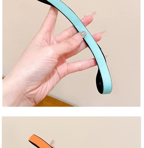 Détail de bandeaux de sport élastiques antidérapants en nylon vert menthe et orange vif
