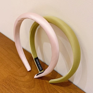 Elegant satin padded headbands in pink and olive green with handmade silk finish