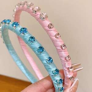 Elegant rhinestone padded headbands in light pink and blue satin for fashion hair styling