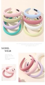 Detailed macro view of colorful handmade sponge headbands with fabric texture