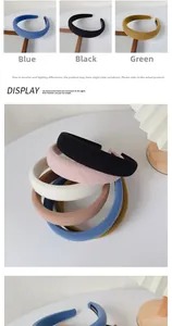 Detail of waffled wide headband showing thick sponge padding and interior non-slip grip