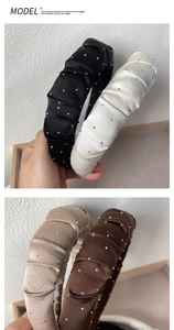 Detail of padded satin headbands with shimmering rhinestones in various colors
