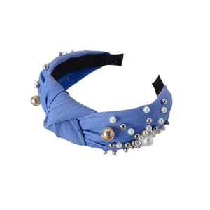 Blue denim knotted headband with pearls and metallic beads for a high crown hairstyle