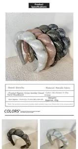 Close-up of padded braided headband with metallic fabric texture and precise size details