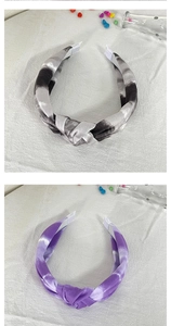 Detailansicht von Batik-Knoten-Haarbändern in Grau und Lila mit elastischem Gummiband