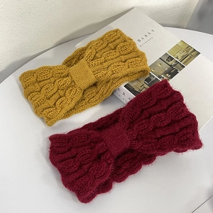 Winter knitted bow headbands in ginger and wine red with thick cable knit texture