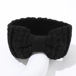 Winter black cable knit headband with bow, warm ear warmer for women's outdoor style