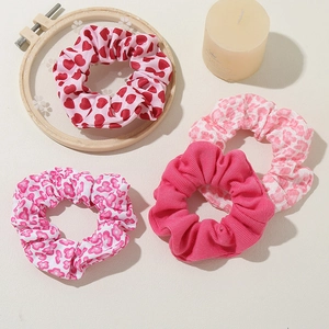 Pink heart and floral scrunchie set with four versatile elastic hair ties for women