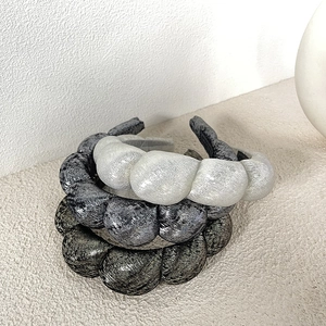 Three-piece set of metallic scrunchie headbands in silver, grey and bronze colors