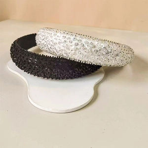Chic padded headband with sparkling sequins and beads in black and silver colors