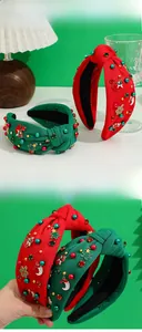 Detail of Christmas headband with pearls, rhinestones and festive metal charms