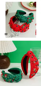 Detail of Christmas knot headbands with festive charms and colorful rhinestones