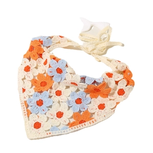 Handmade crochet floral triangle headscarf with white, blue, and orange knit patterns