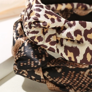 Vintage leopard and snake print cross-knot headbands in glossy fabric for women