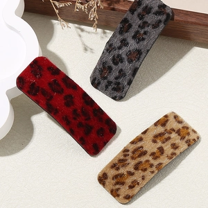Three-piece leopard print plush hair clips set in red, gray and brown colors