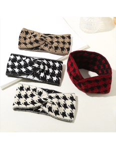 Classic houndstooth knitted headbands in four colors with twisted center design