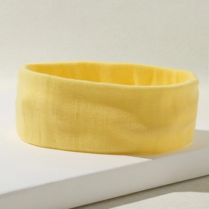 Diadema deportiva elástica amarillo brillante para yoga y fitness en tejido de punto