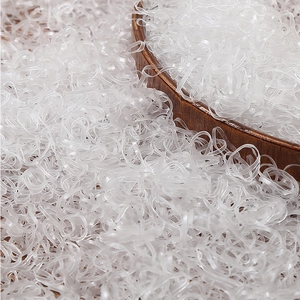 Bulk pack of high-elasticity clear TPU hair bands for women and kids in a wooden tray
