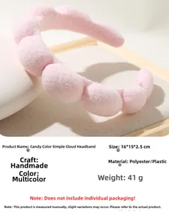 Pink cloud-style plush headband detail with dimensions 16x15x2.5cm and material specs