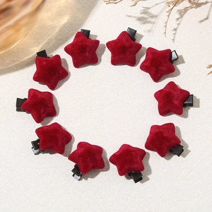 Set of 10 red flocked star-shaped hair clips with metal base for women’s hair styling