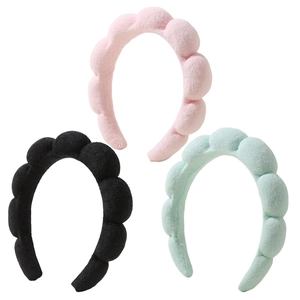 Thick wavy cloud headbands in pink black and green for skincare and makeup