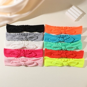 Set of 10 colorful elastic knit baby headbands with cute rabbit ear bows in various shades
