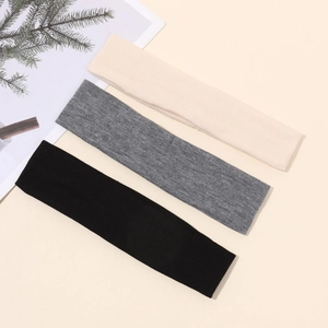 Three-pack elastic sports headbands in black, grey, and cream colors for yoga and fitness