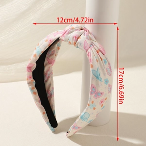 Detailansicht des geknoteten Blumen stirnbands mit Maßen 12cm Breite und 17cm Höhe