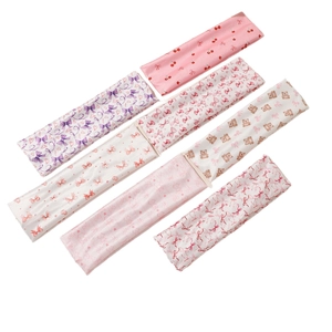Set of 7 elastic cartoon bear and bow print headbands in sweet pastel colors and patterns